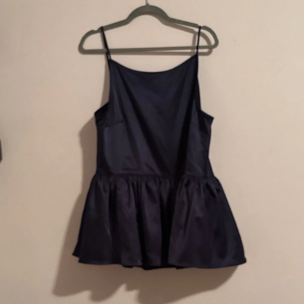 Anthropologie Navy Peplum Top